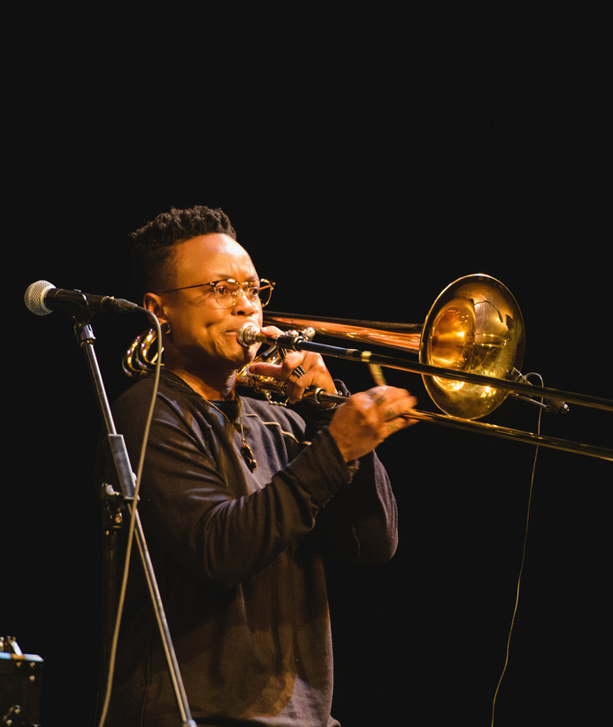 A student performing with a trombone