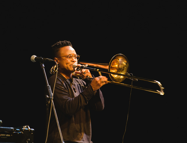 A student performing with a trombone