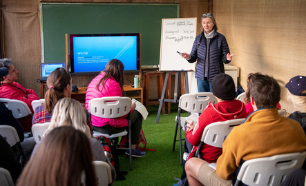 Professor talks to a group of students