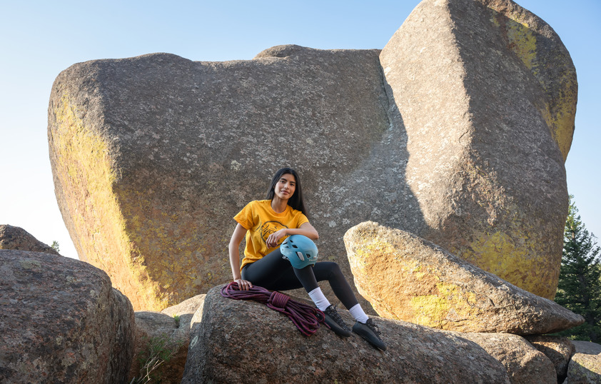 A climber smiles for a picture in Vedauwoo