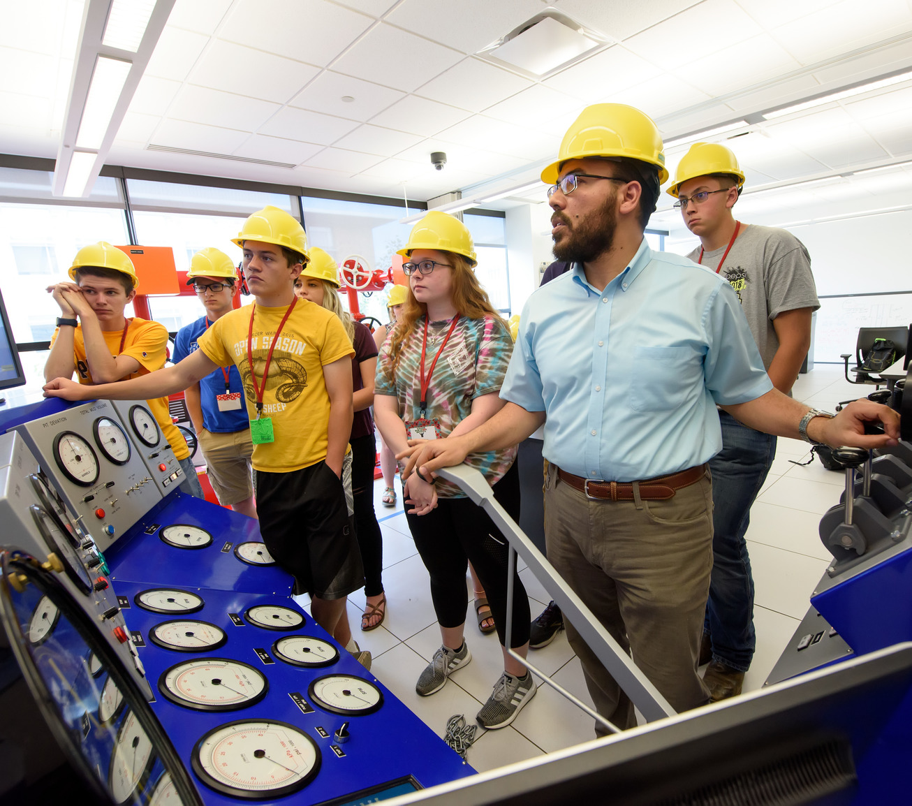 Professor teaching students in lab