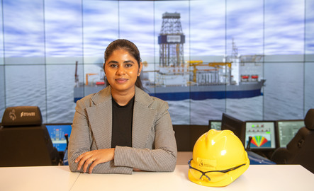 Petroleum engineering student posing in lab