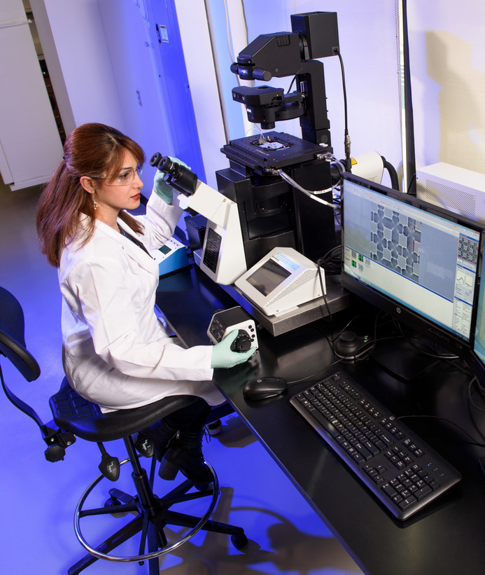 A petroleum engineering student in a lab