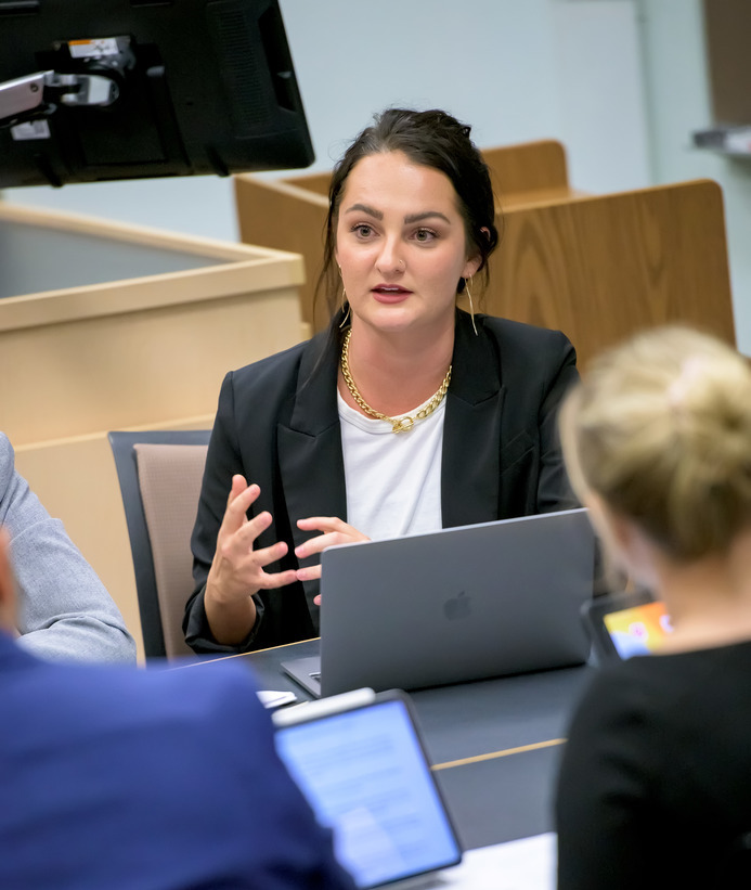 Marketing student talks to a group