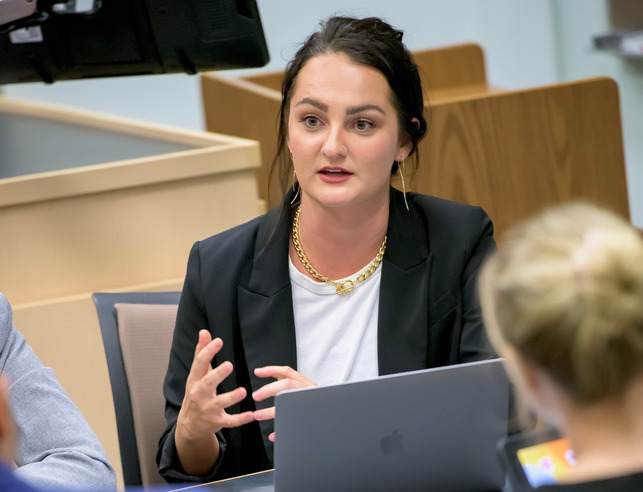 Marketing student talks to a group