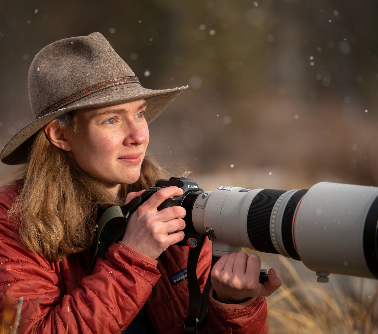 Photographer posing with camera