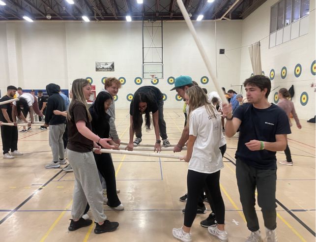 Students in a Physical Education class working together