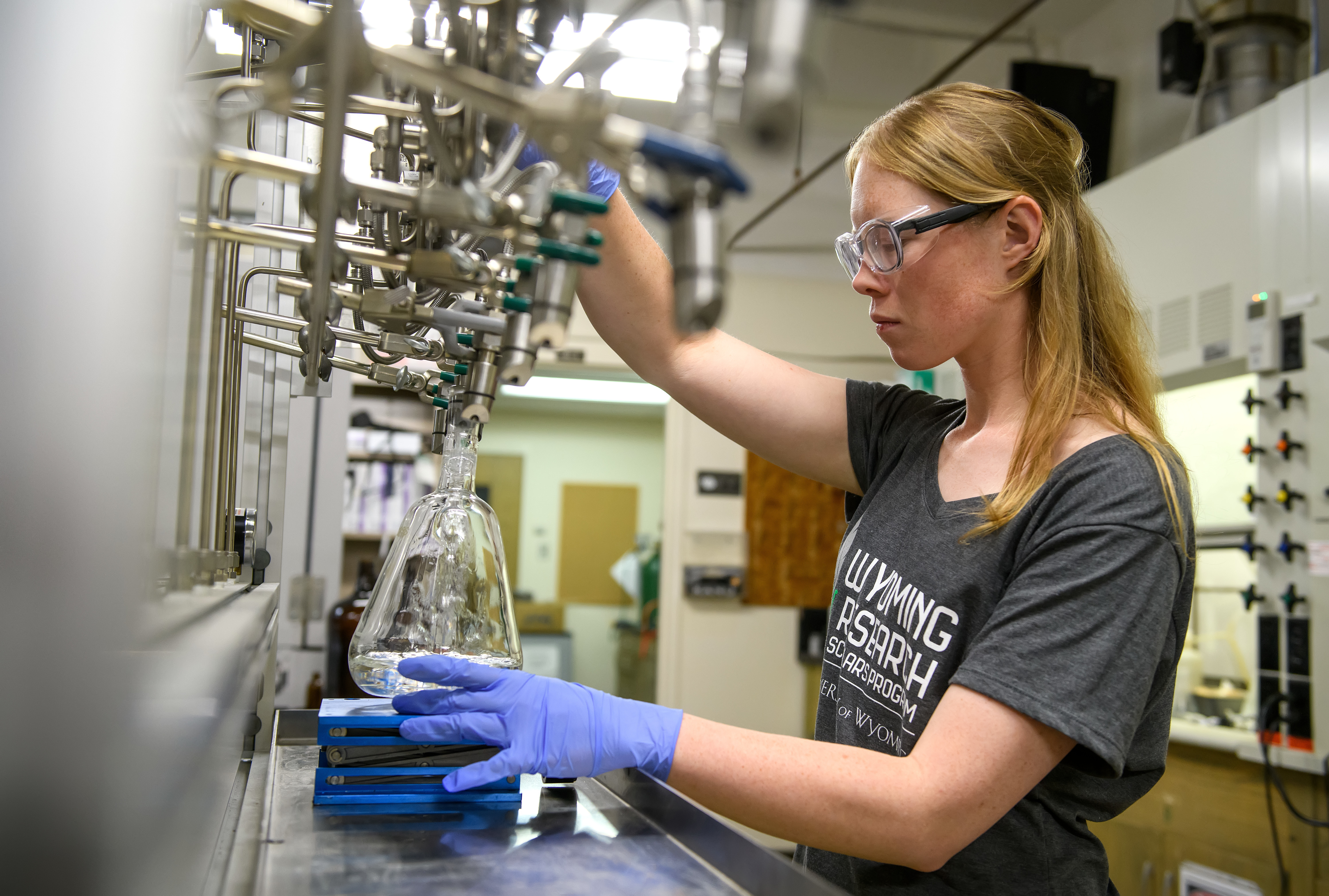 Physics student in the lab