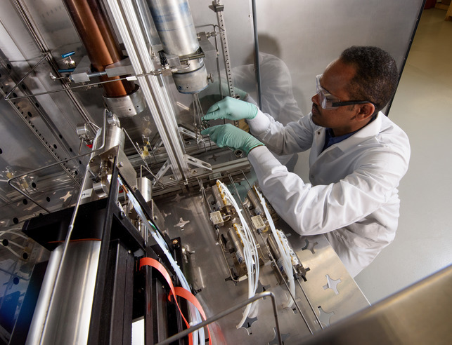 Physics Ph.D. student in the lab