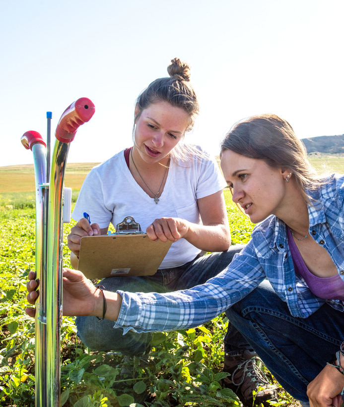 Two students in the field