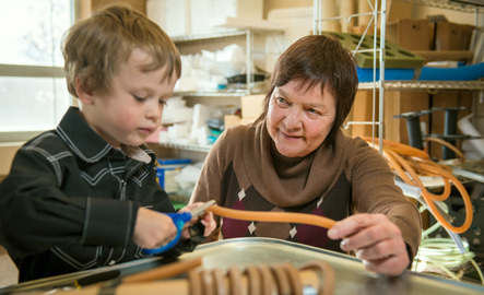 Play therapy counselor playing with client