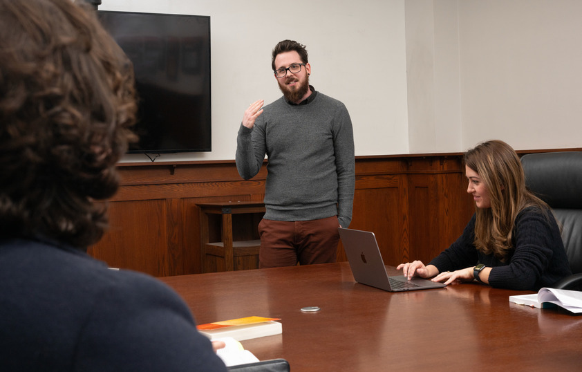 A professor speaking in class