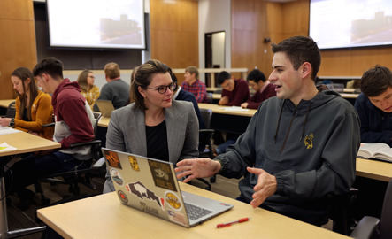 Two public law students talking in class
