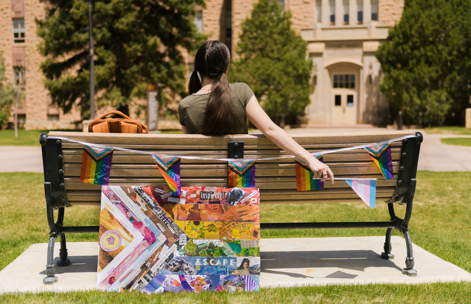 Student sitting with flags