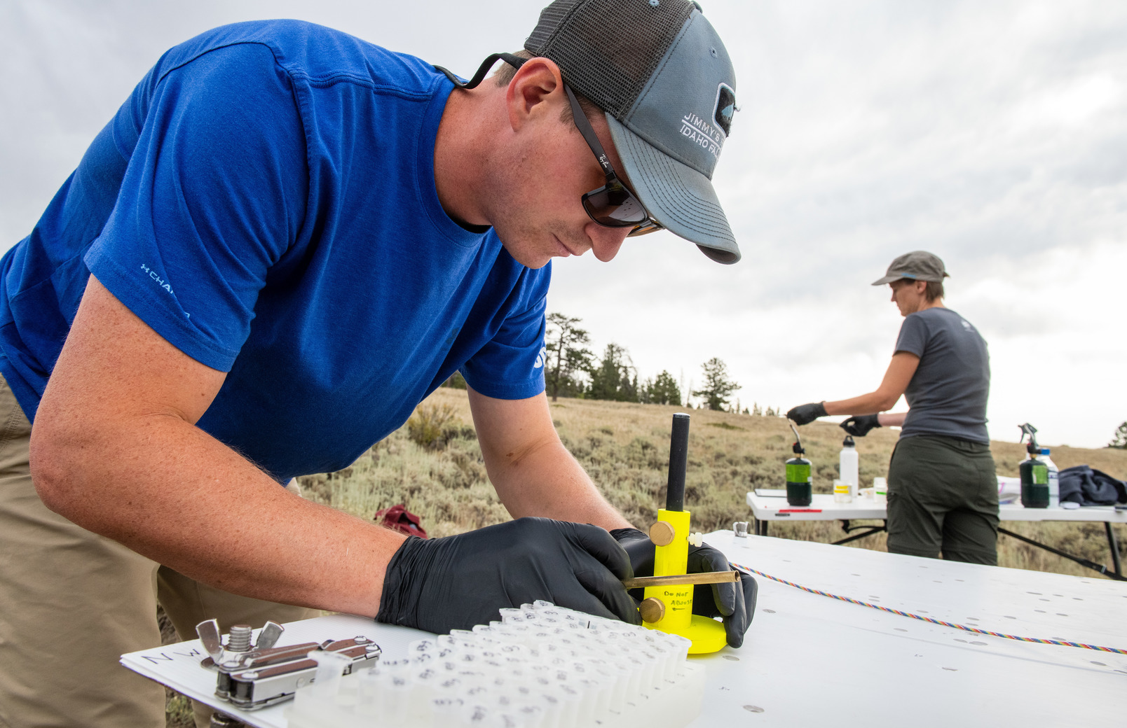 Two graduate students out in the field
