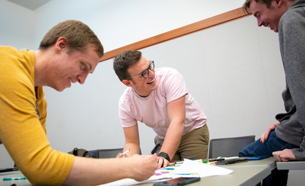 A group of students work on a group project