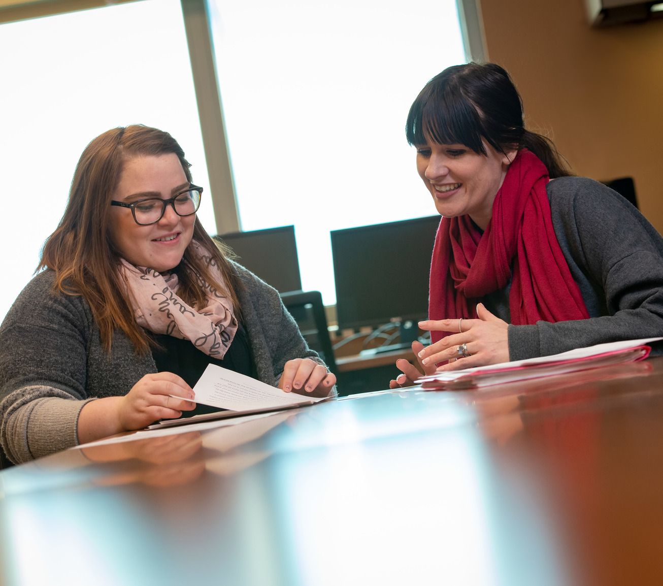 Student working with speech-language pathologist