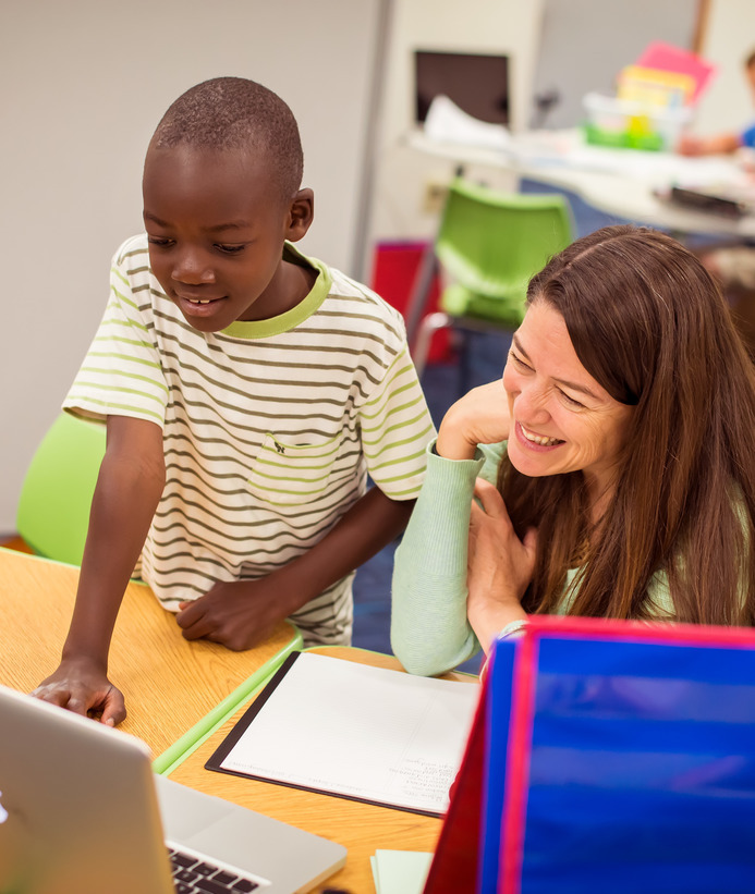 Elementary school teacher and student