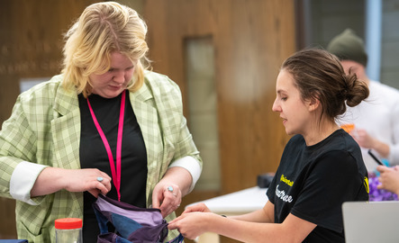 Two students in sewing class