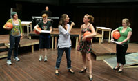 People rehearsing a play
