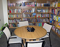 Table, chairs, and bookcase
