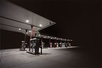 Artistic photo of modern gas station pumps
