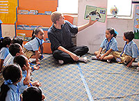 Man teaching children