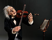 marionette of an elderly violinist