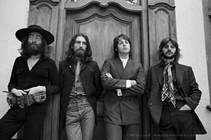 black and white photo of four men