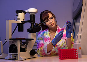 woman using lab equipment
