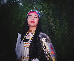 woman in Native American regalia