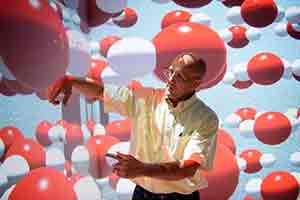 man in field of virtual bubbles