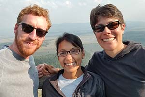 three people standing together