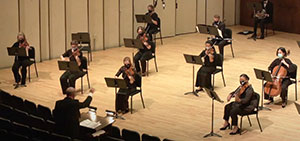 symphony playing on stage