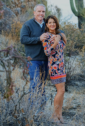 man and woman standing outside