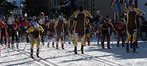group of Nordic skiers starting a race