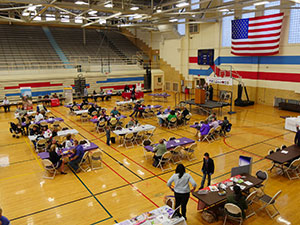 gym full of tables and people