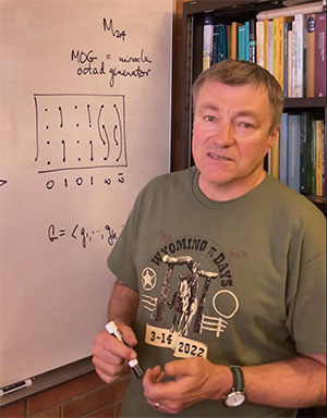 man standing at a whiteboard