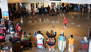 Native hoop dancer performing