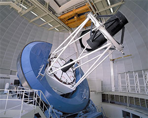 large telescope with equipment mounted on it