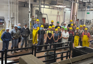 group of students with hrd hats