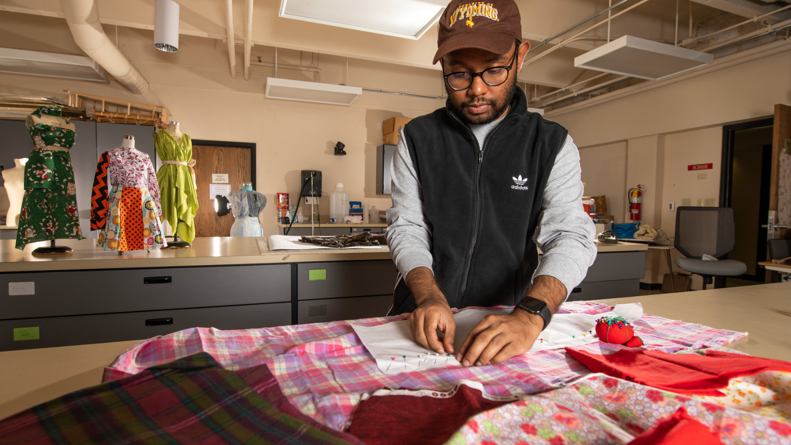 student working on a design and textile project
