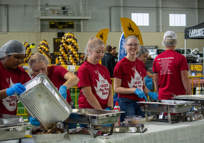 students volunteering at AgDay BB@