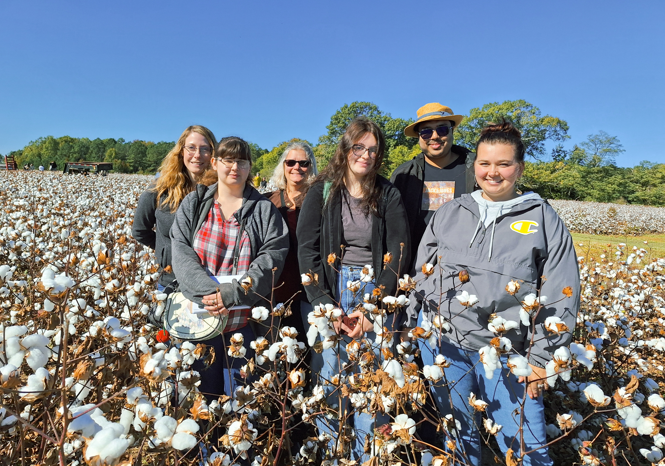 Students, Jennifer Harmon, and assistant professor Amy Shane- Nichols tour a family-owned cotton farm during their visit to Cotton Incorporated's headquarters in 2024. From left to right, Tristen Morrison, Izzy Nichols, Sheridan Rudziewicz (first row) with Imranul Islam, Harmon, and Shane- Nichols. Photo by Amy Shane- Nichols.