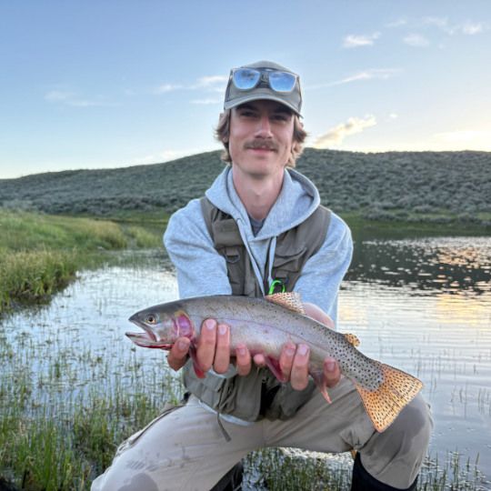 Student holding fish