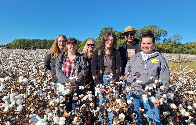 Student in a cotton field
