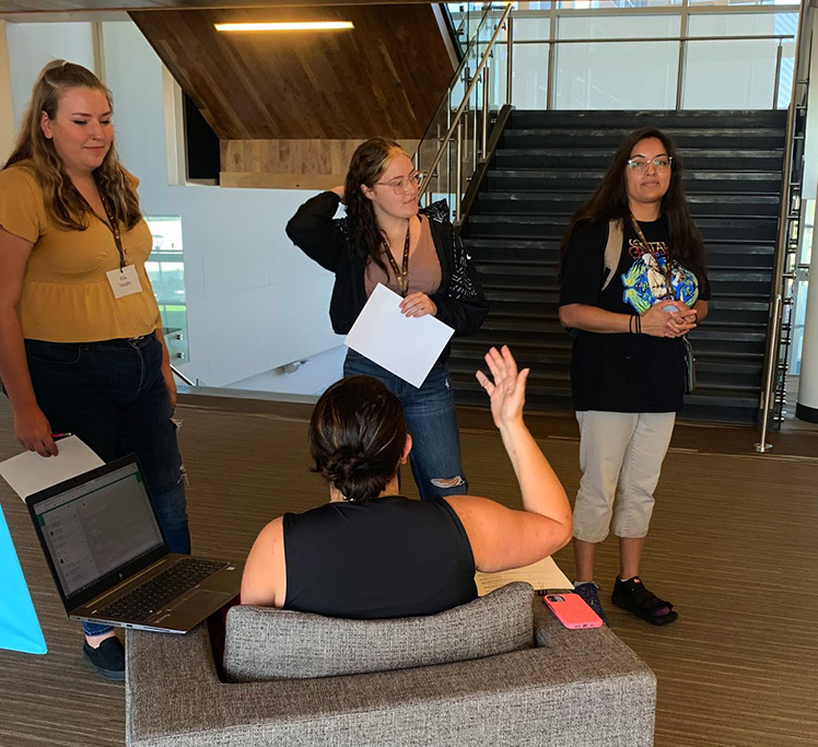 UW Casper students talking in lobby