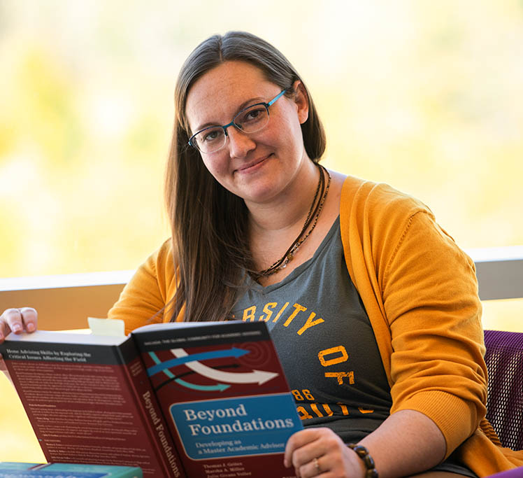 Student reading a book