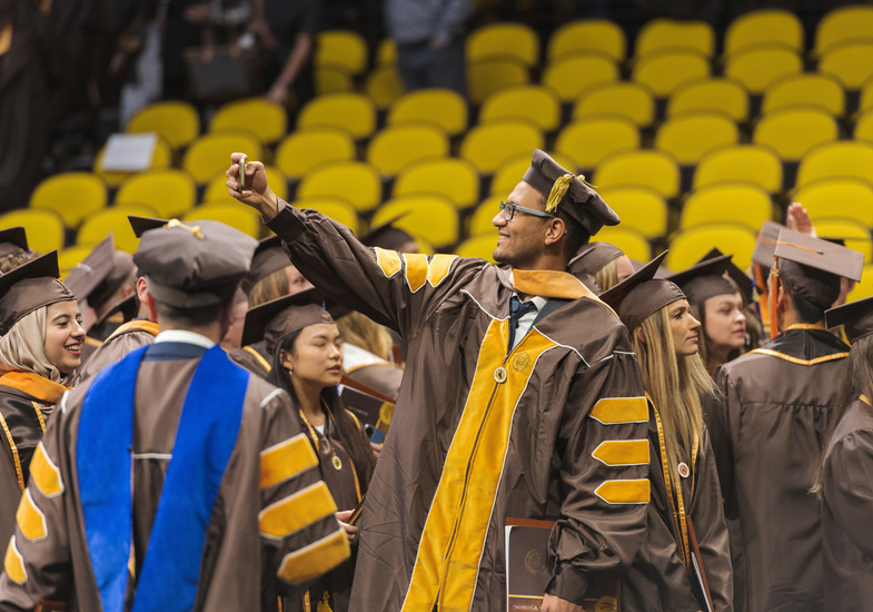 UW students in regalia at graudation