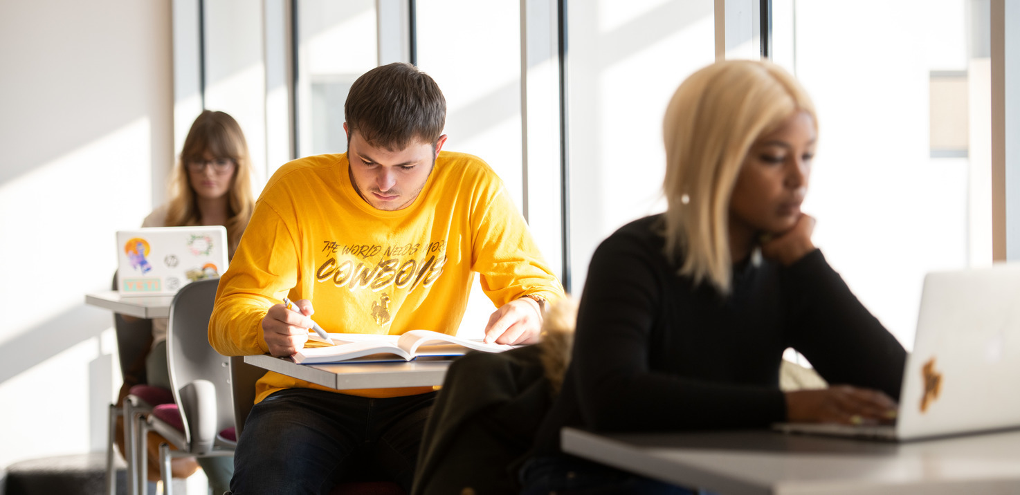 three students study